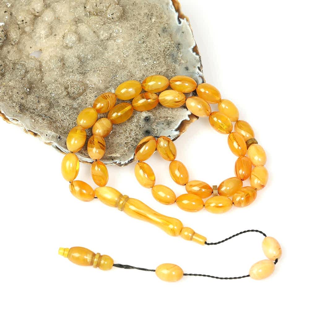 Hareli Sarı Sıkma Kehribar Tesbih (7×11 mm)